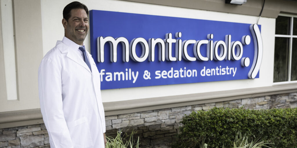 Smiling dentist at Monticciolo Family Dentistry. Smiling dentist at Monticciolo Family Dentistry.